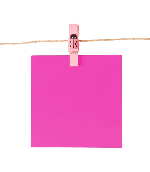 Bloc de notas rosa fijado aislado sobre fondo blanco — Foto de Stock