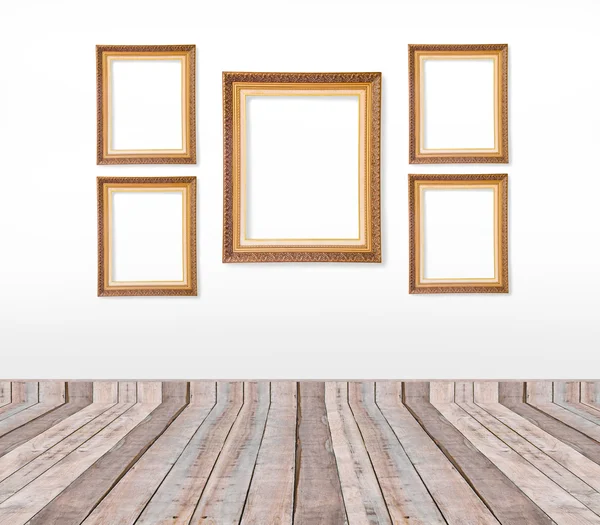 Set gouden vintage foto frames op de muur — Stockfoto