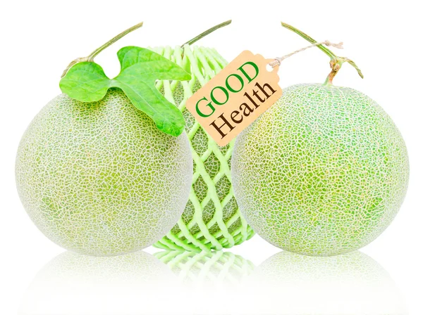 Vele verse meloen en groene schuim net — Stockfoto