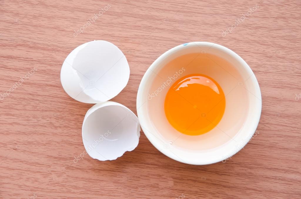 Fresh duck egg in cup