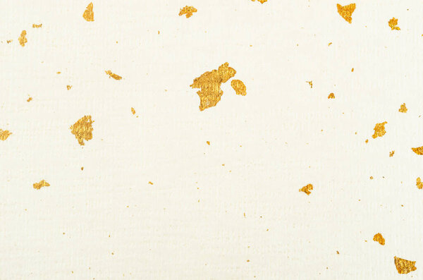 Бумага с текстурой золотого листа в качестве фона.