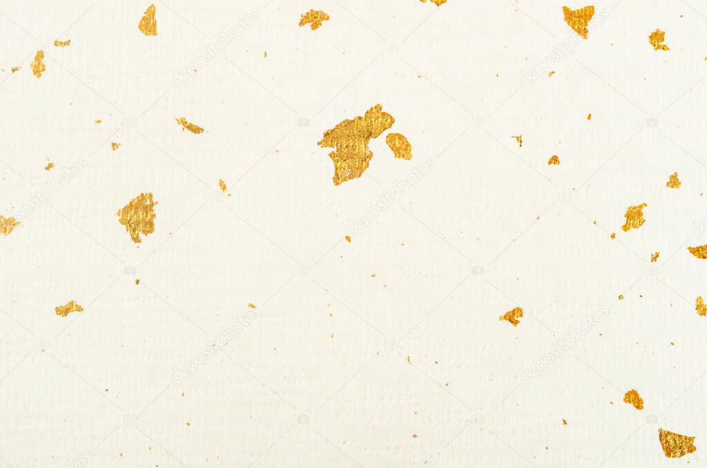 The Paper with gold sheet texture as background.