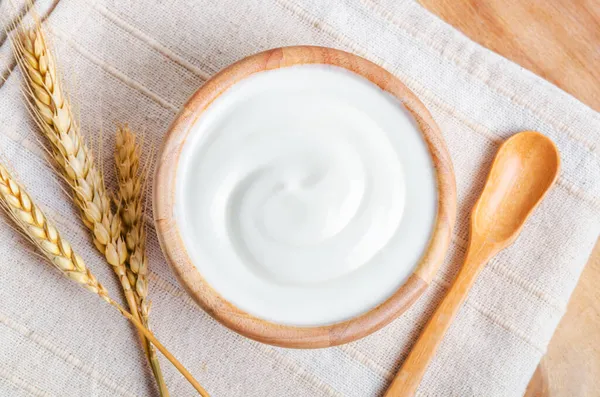Greek Yogurt Wooden Bowl Dry Barley Wooden Background — Stock Photo, Image