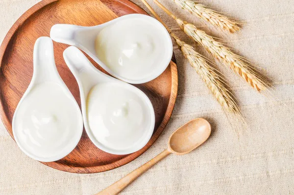 Greek Yogurt Wooden Bowl Dry Barley Tablecloth — Stock Photo, Image