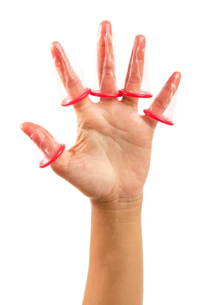 Cinco Dedos Mão Sob Preservativo Rosa Isolado Fundo Branco Salve — Fotografia de Stock