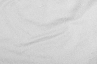 Arka plan olarak, giysiler için gri kumaş dokusu.