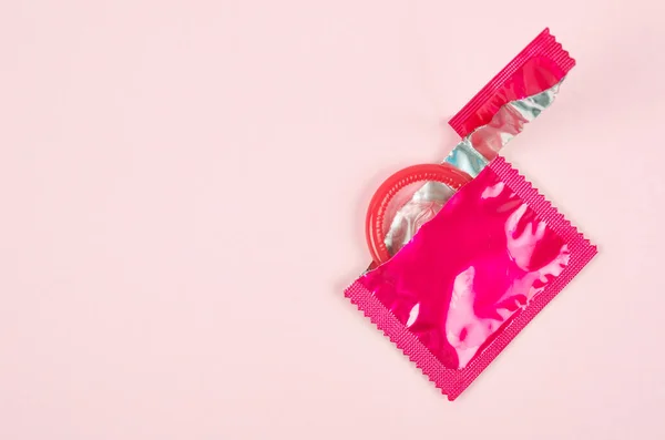 Pink Opened Condom Unpack Pink Background Safe Sex Reproductive Health — Stock Photo, Image