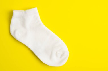 The White socks on yellow background