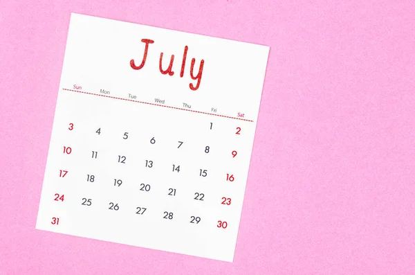 2022年7月的带有空格的粉色背景日历 — 图库照片