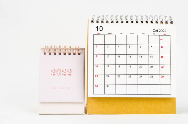 The October 2022 desk calendar on white background.
