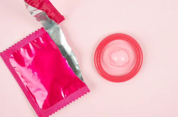 Pink Opened Condom Condom Pack Pink Background — Stock Photo, Image