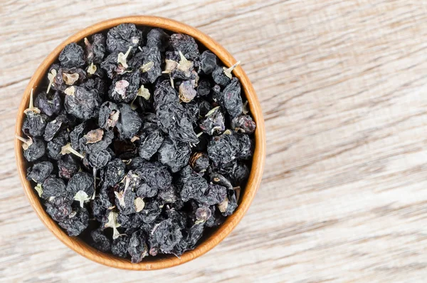 Bacche Lupo Nero Bacche Goji Nero Una Ciotola Legno Sul — Foto Stock