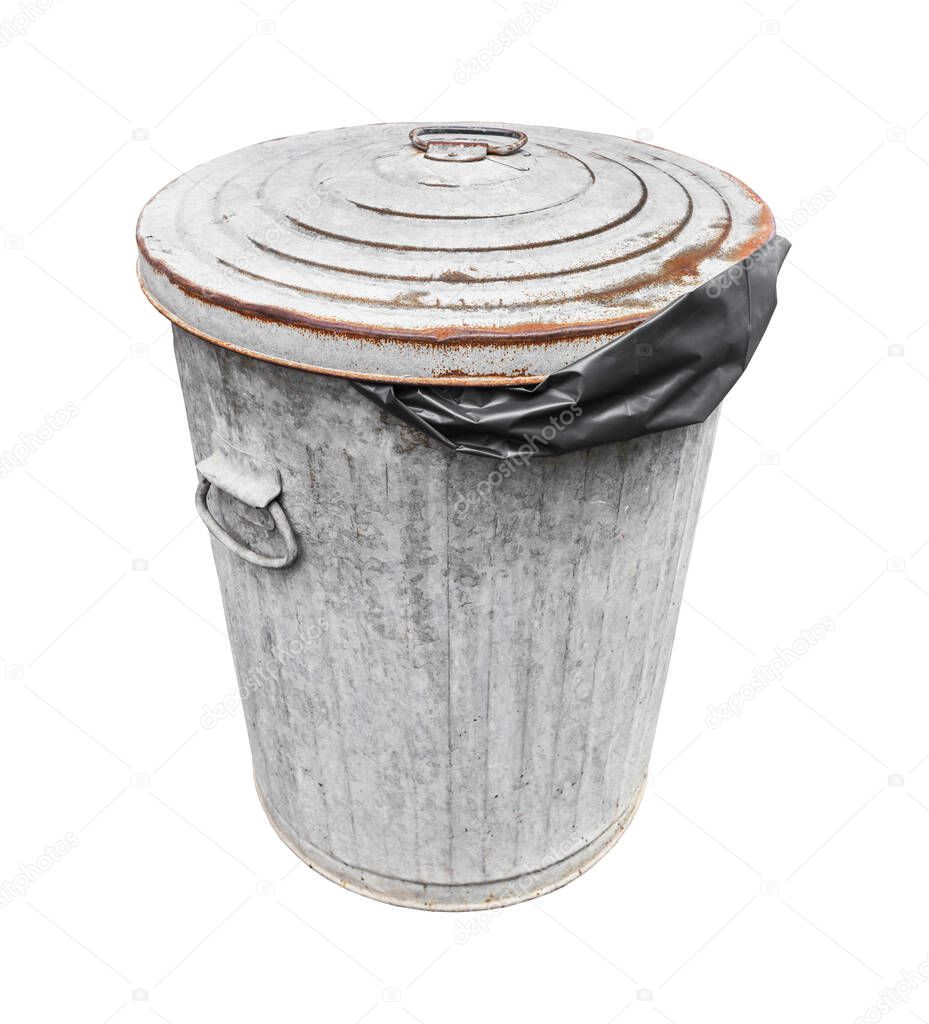 The Rusty old trash with black plastic bag can isolated on white with a clipping path.