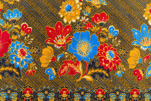Thailand - June 12th 2022 : The Batik sarong with floral pattern background in Thailand, traditional batik sarong in Asian.