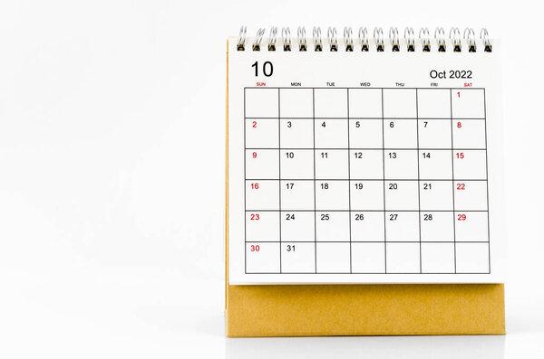 October 2022 desk calendar on white background.