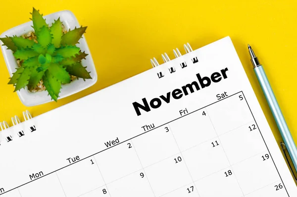 November 2022 Desk Calendar Pen Plant Pot Yellow Background — Stock Photo, Image