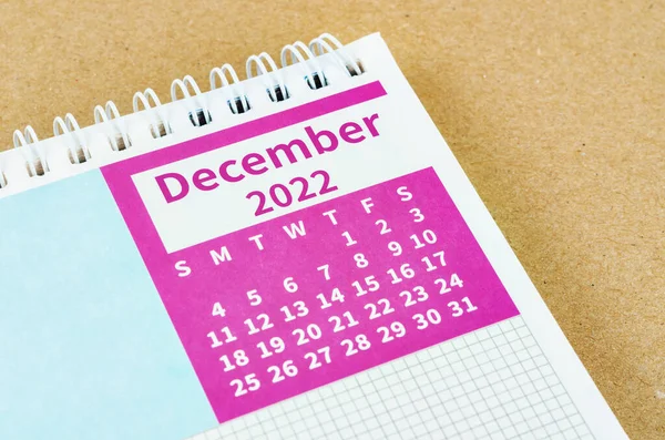 Close December 2022 Desk Calendar Yellow Background — Stock Fotó