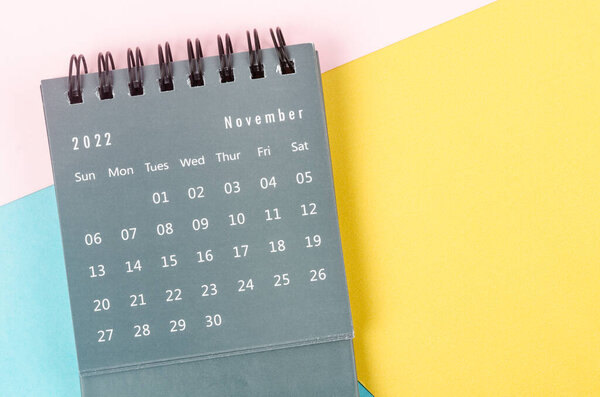 November 2022 Monthly desk calendar for 2022 year on beautiful background.