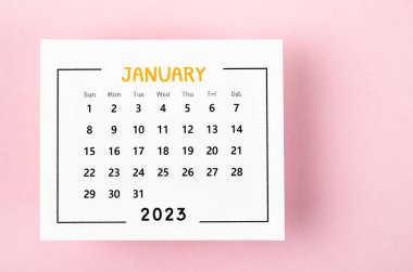 2023 tarihli Janauary takvimi pembe arka planda..