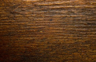 Antika ahşaptan yapılmış güzel ahşap bir arka planın dokusu. Eski usul maun renginde. Metin için tahta arkaplan.