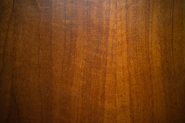 Foto de una textura de caoba cubierta con barniz brillante. Panel de madera de muebles. — Foto de Stock