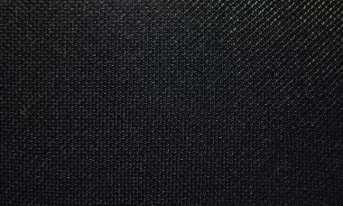 Photo of the mesh texture for the audio speaker. Macrophotography of the black grid.