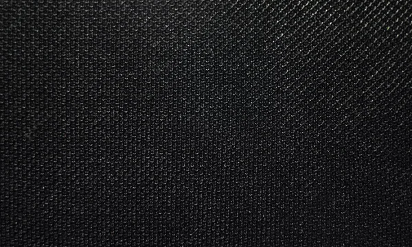 Photo of the mesh texture for the audio speaker. Macrophotography of the black grid. — Fotografia de Stock