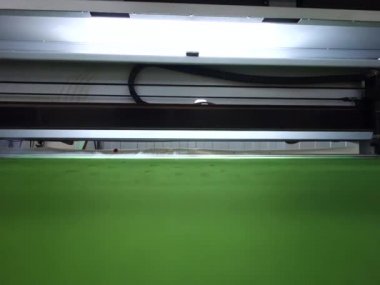 Electronic laser cutting machine. Cutting felt material with a laser. Production of interior parts.