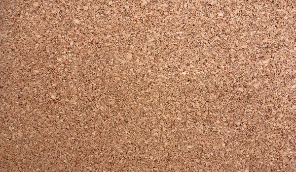 Photo of the cork wall texture. Cork stand in the office. — Stockfoto