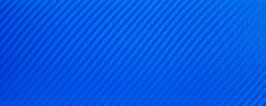 Mavi karbon fiberin dikdörtgen dokusu. Yarış arabaları yapıştırmak için karbon film fotoğrafı. Metin için spor arkaplanı.