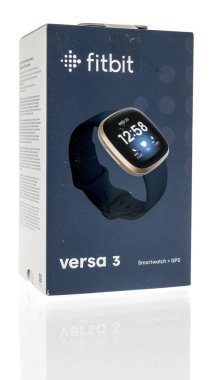 Winneconne, WI -23 January 2021: A package of fitbit versa 3 smart watch on an isolated background clipart