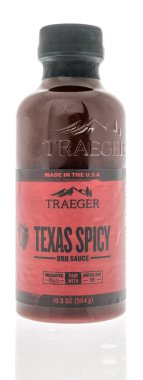 Winneconne, WI - 6 June 2022: A bottle of Traeger Texas spicy bbq sauce on an isolated background.