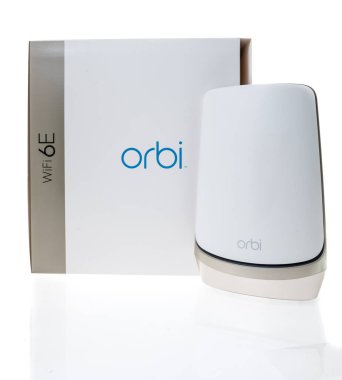 Winneconne, WI - 20 August 2022:  A Package of Netgear Orbi AXE11000 RBKE963 the ulitmate in smart home WIFI quad band mesh wifi system on an isolated background.