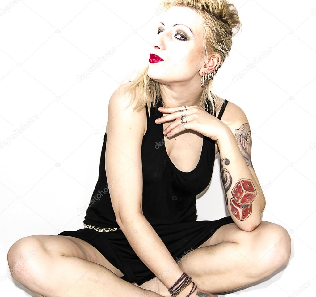 Blonde punk girl with tattoos