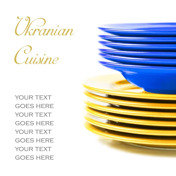 Stack of colorful ceramics plates in Ukranian colors — Stock Photo, Image