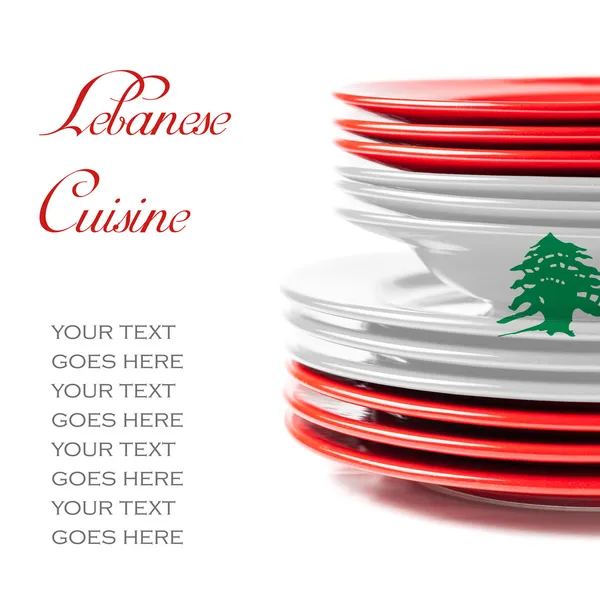 Stack of colorful ceramics plates in Lebanese colors — Stock Photo, Image