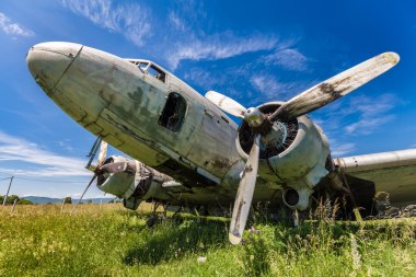 Remains of an abandoned Dakota DC3 aircraft from World War II on clipart
