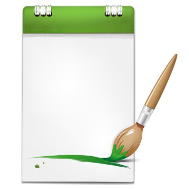 Yeşil fırça ve Notebook mesajınız için boş sayfa