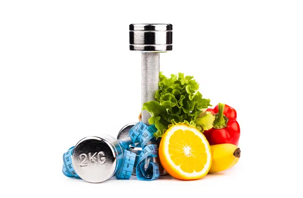 Fitness equipment with fruits — Stock Photo, Image