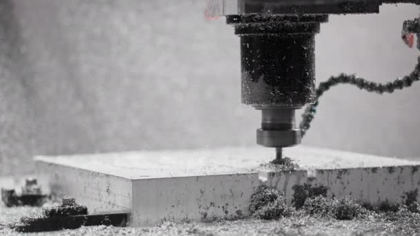 Slow-motion close-up of CNC. Operator adjusts direction of cooling system — Stock Video
