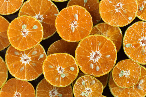 Top view of fresh half orange - healthy food prepare for make orange juice as background