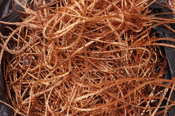Bag of electrical copper waste, scrap copper wire material for recycling business - expensive metal.