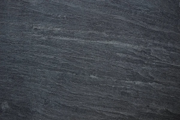 Koyu gri kayrak arkaplan veya doku.