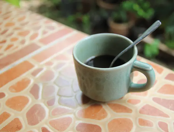 Schwarze Kaffeetasse Auf Marmorgemustertem Hintergrund — Stockfoto