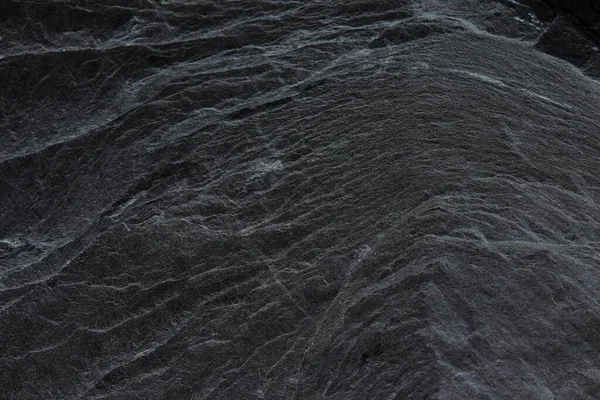 Koyu gri kayrak arkaplan veya doku.