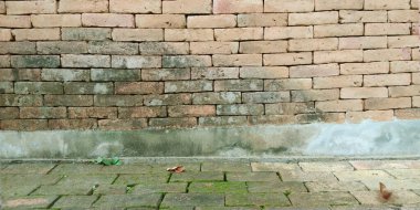 Eski tuğla duvar, kırmızı taş blokların eski dokusu yakın plan