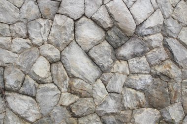 Arkaplan ya da doku olarak taş duvar. 
