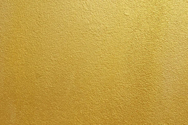 金色的混凝土墙上背景纹理 — 图库照片