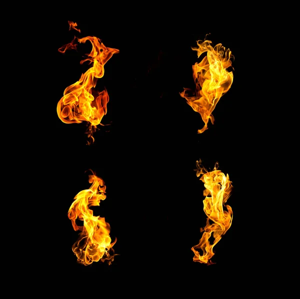 Yangın alevleri koleksiyonu siyah arkaplanda izole edildi