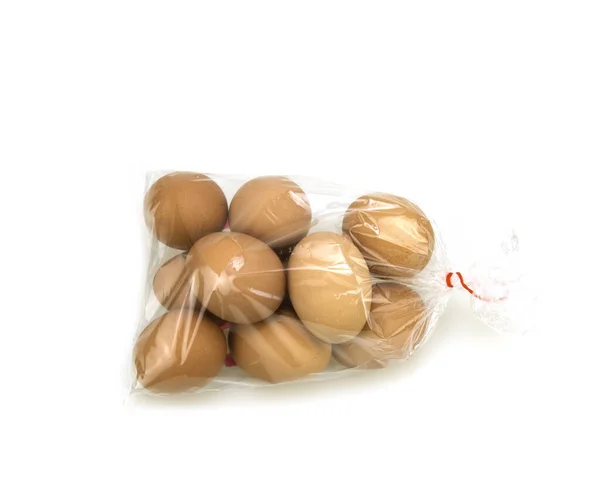 Yumurtalar Beyaz Arkaplanda Plastik Bir Çantada — Stok fotoğraf